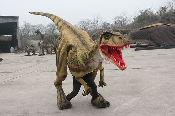 Alışveriş merkezinde görüntülenen esnek sızdıran güneş koruyucu özel gerçekçi dinozor kostümü